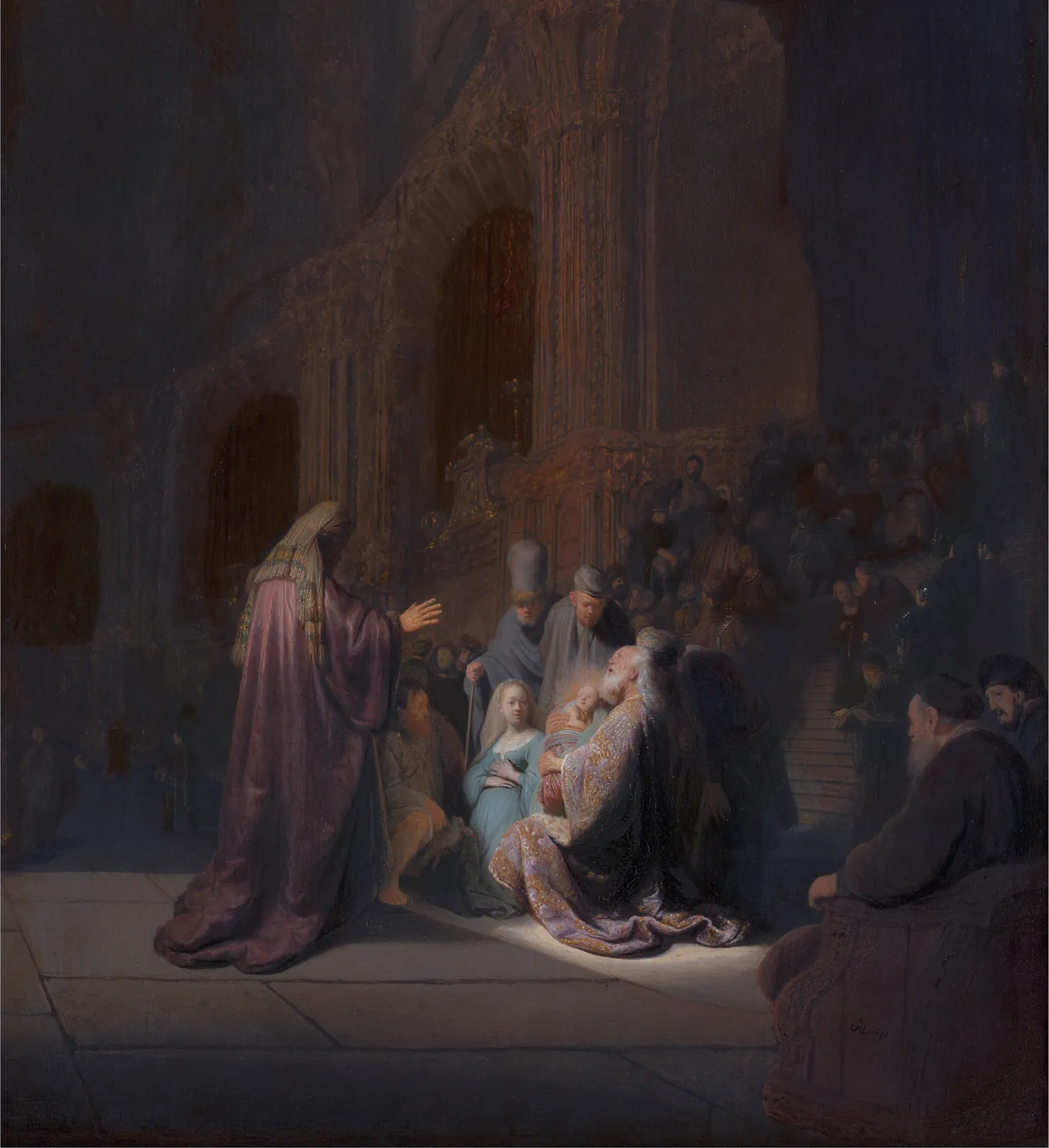 A great dark temple. An old man in a purple robe reaches toward a baby held by a kneeling woman. Pale light falls on the baby and on the people around him.