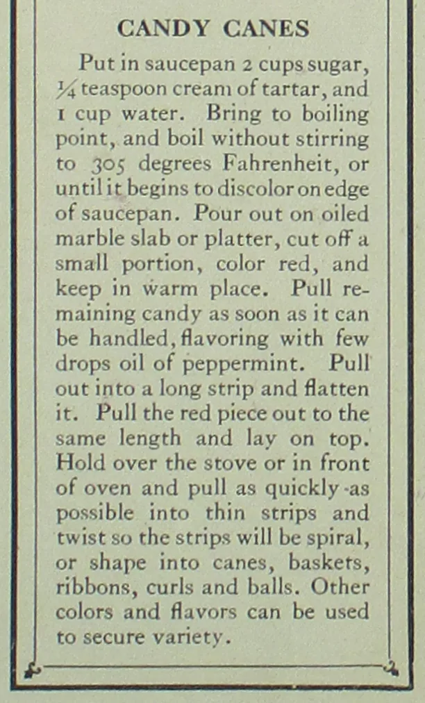 A printed page of instructions headed Candy Canes, a recipe for boiling sugar and pulling and twisting it into red and white canes.